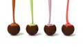 Milk chocolate praline set in a row with colourful cream filling