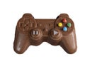 Milk chocolate in the shape of a video game controller alongside small rabbits_2 Royalty Free Stock Photo