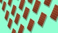 Milk chocolate tablets on cyan background