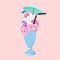 Milk cocktail with strawberry, cherry, orange, cream, straw, umbrella, candy. Royalty Free Stock Photo