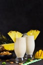 Milk cocktail with vanilla ice cream, pineapple and mango Royalty Free Stock Photo
