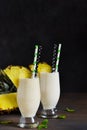 Milk cocktail with vanilla ice cream, pineapple and mango Royalty Free Stock Photo