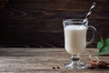 Milk cocktail on wooden table