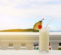 Milk coconut cocktail on table at beach cafe Royalty Free Stock Photo