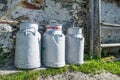 Milk containers produced by peasants in the mountains Royalty Free Stock Photo