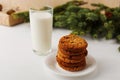 Milk and cookies for Santa Claus under the christmas tree. Concept, copy Space Royalty Free Stock Photo