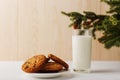 Milk and cookies for Santa Claus under the christmas tree. Concept, copy Space Royalty Free Stock Photo