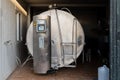 Milk cooling tank in a dairy farm. Milk storage and cooling.