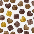 Milk, dark and golden glitter chocolate candies isolated on white background. Royalty Free Stock Photo