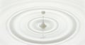 Milk drop created ripple Royalty Free Stock Photo