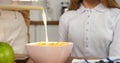 Milk elegantly flows into cereal bowl cinematic slow-motion family breakfast Healthy tasty start for family serene home