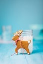 Milk and Gingerbread Reindeer Christmas Cookie over blue