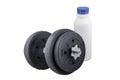 Milk in a glass and Big black dumbells ,over white background Royalty Free Stock Photo