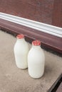 Doorstep Delivery of Milk in Glass Bottles Royalty Free Stock Photo