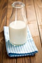 Milk in glass jar on napkin Royalty Free Stock Photo