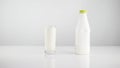 Milk in a glass, plastic bottle with dairy products,white background. Royalty Free Stock Photo