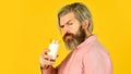 Milk for good health. Lactose free. Bearded man hold glass of milk. Vegan milk concept. Drink protein cocktail. Healthy