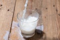 Milk. Image of Milk fall into glass. Royalty Free Stock Photo