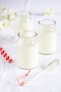 Milk jars with small spoon