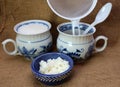 Milk kefir grain and fresh homemade kefir fermented milk with plastic sieve and spoon Royalty Free Stock Photo