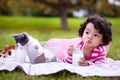 Milk, picnic and a girl in the park with her cat together for love, care or bonding during summer. Drinking straw Royalty Free Stock Photo