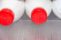 Milk in plastic bottles is on the shelf in the refrigerator Royalty Free Stock Photo