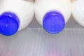 Milk in plastic bottles is on the shelf in the refrigerator Royalty Free Stock Photo