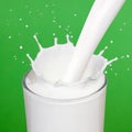 Milk pouring into a glass. Royalty Free Stock Photo