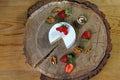 Milk production - cheese camembert or brie and ripe strawberry and walnuts on a round board. Top view with copy space. set Royalty Free Stock Photo