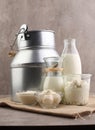 milk products - tasty healthy dairy products on a table on: sour cream in a white bowl, cottage cheese bowl, cream in a a bank and Royalty Free Stock Photo