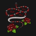 Milk snake with flowers in Vintage style. Serpent cobra or python or poisonous viper. Engraved hand drawn old reptile