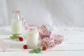 Milk with sugar sprinkles, strawberries and cupcake wrapper Royalty Free Stock Photo