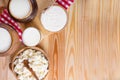 Milk in various dishes on the old wooden table. village dairy products Royalty Free Stock Photo