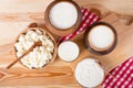 Milk in various dishes on the old wooden table. village dairy products Royalty Free Stock Photo