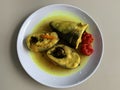 milkfish boiled in yellow sauce, very tasty with sour and fresh taste Royalty Free Stock Photo