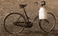 Milking bicycle with aluminum milk canister to deliver milk Royalty Free Stock Photo