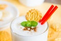 Milkshake (banana smoothie) with mint, nuts and cookies Royalty Free Stock Photo