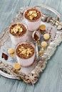 Milkshake with chocolate and cookies on a vintage tray