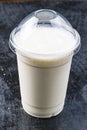 Milkshake clear plastic Cup Royalty Free Stock Photo