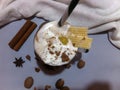 Milkshake with cream, spices, decorated with waffles and chocolate chips Royalty Free Stock Photo