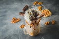 Milkshake drink with dripping sauce, cream, cake and cookie Royalty Free Stock Photo