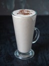 Milkshake with fruits and chocolate in a high glass goblet Royalty Free Stock Photo