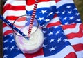 milkshake or smoothie with america flag patriotic symbols.picnic in nature on holiday.