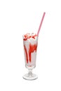 Milkshake with strawberry syrup in glass cup