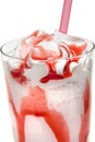 Milkshake with strawberry syrup in glass cup
