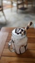Milkshake with wafer stick a sweet beverage made by blending milk, ice cream, and flavorings or sweeteners