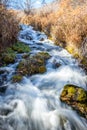 Milky Flowing Waterfall in Autumn