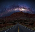 The Milky Way galaxy over a desert road Royalty Free Stock Photo