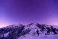 Milky Way Galaxy. Purple night sky stars above mountains Royalty Free Stock Photo