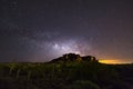 The Milky Way and starry night sky over the Superstition Mountains Royalty Free Stock Photo